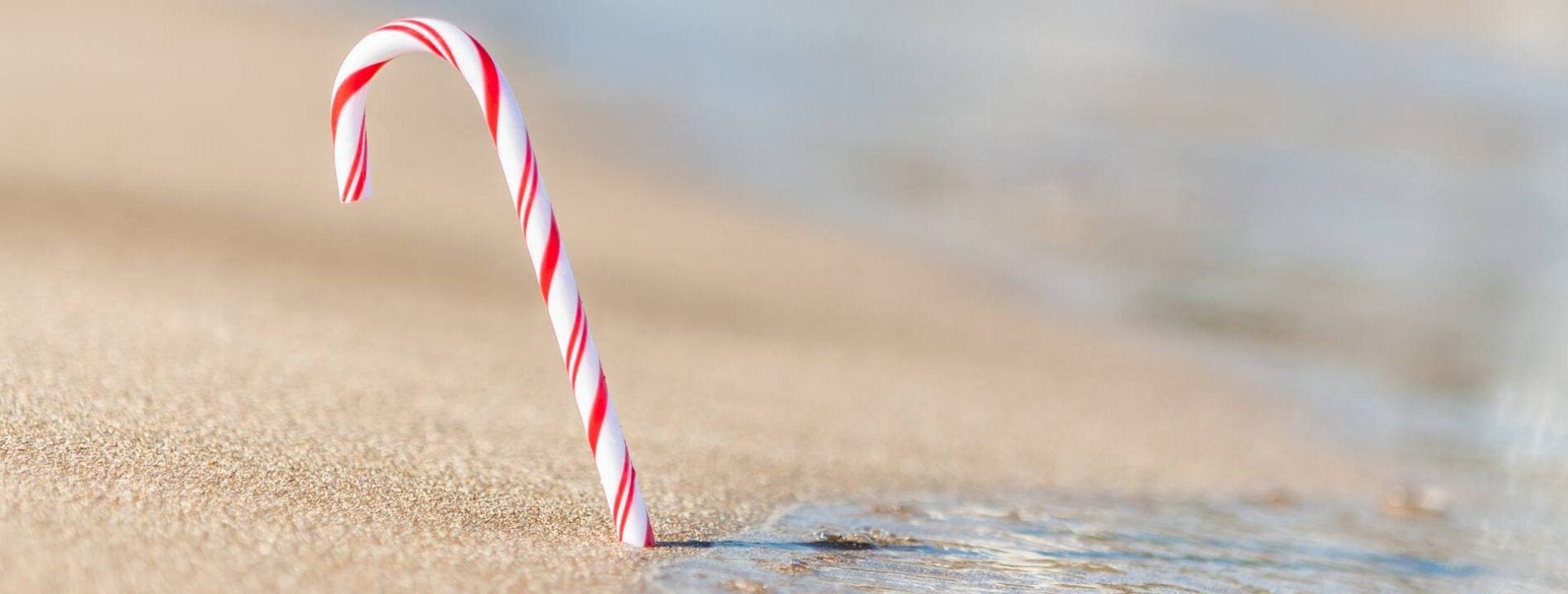 candy cane in sand