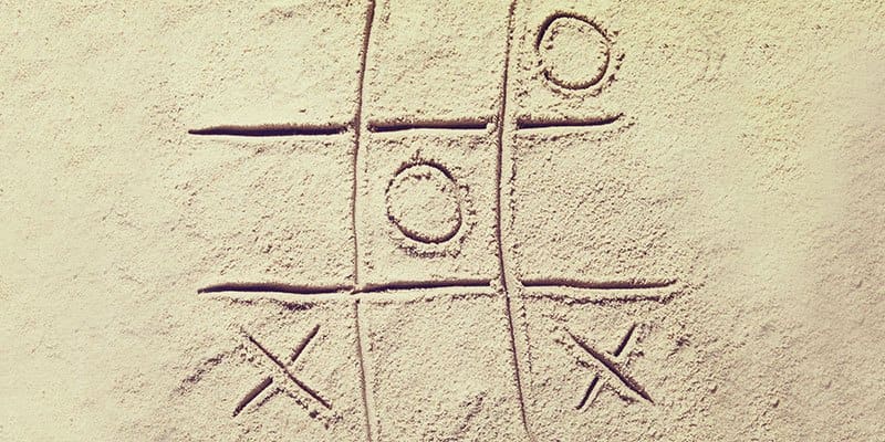 Play a jumbo game of noughts and crosses in the sand